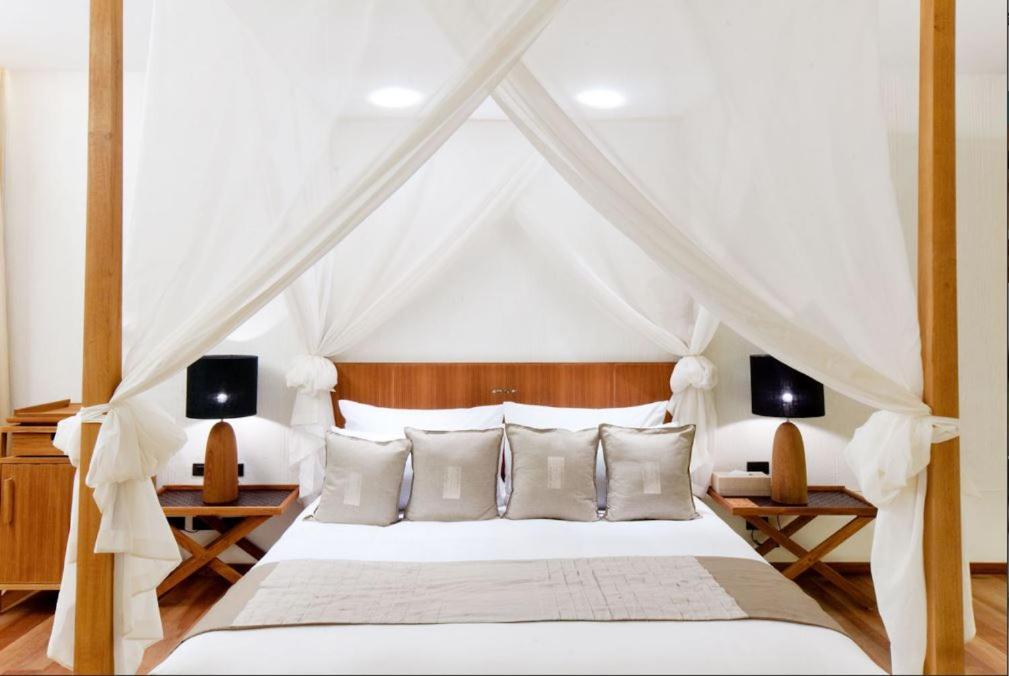 Hansar Samui Resort & Spa - Sha Extra Plus Bophut Exterior foto A bed with a mosquito net